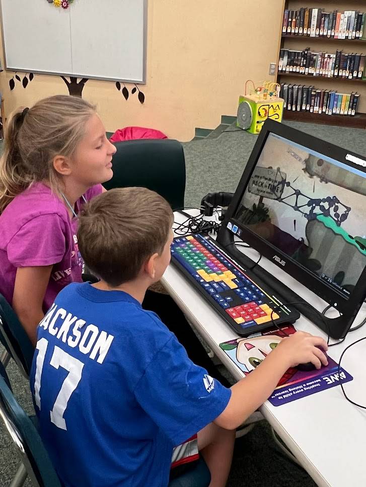 Two children at AWE station